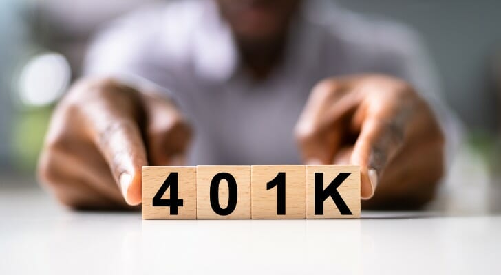 man-with-401k-blocks-picture-SmartAsset