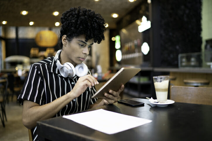 A woman compares high-yield savings accounts.