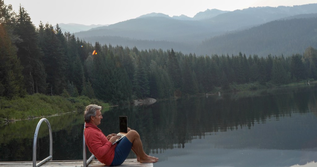 A wealthy investor reviewing a portfolio managed by a financial advisor.