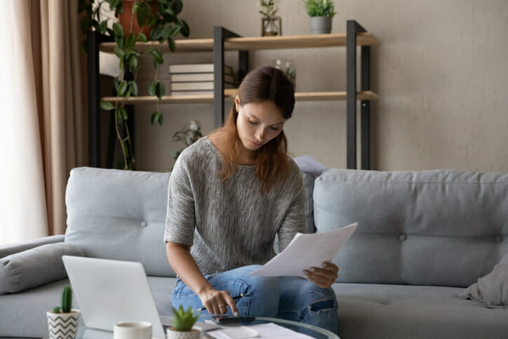 A woman reviews the pros and cons of online banking.