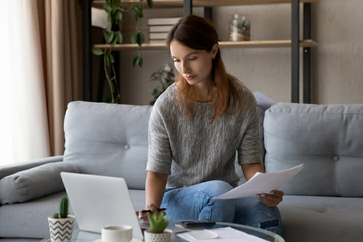 A woman reviewing her savings account.