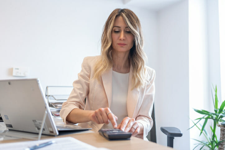 A woman reviews her high-yield savings account.
