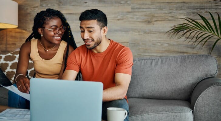 A couple discuss opening a joint savings account.