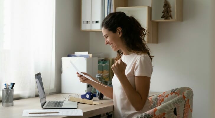 A woman reviews her savings account.