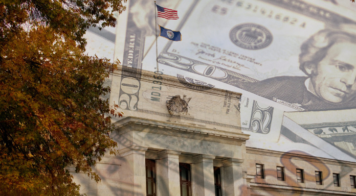 Closeup of the Federal Reserve and $20 dollar bills.