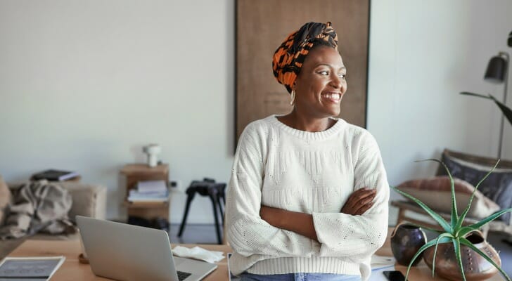 A self-employed worker reviewing her retirement plan.