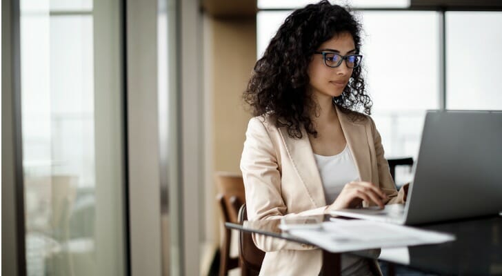 Businesswoman working on a laptop.
