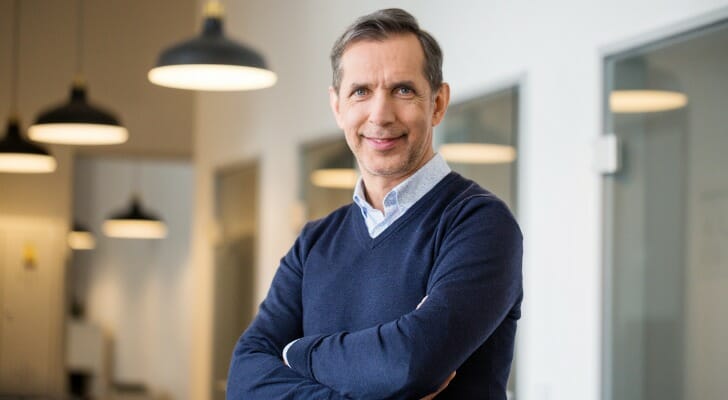 A man secure in his investment choices, having learned the difference between ordinary dividends vs. qualified dividends.