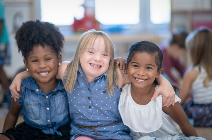 A group of children in a classroom.