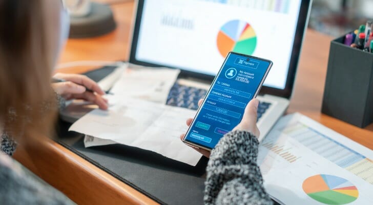 A woman using a mobile app for digital banking.