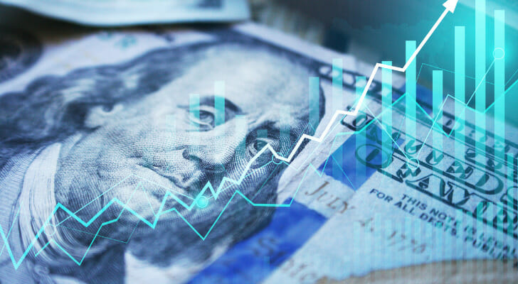 A dollar bill overlaid with a stock chart.