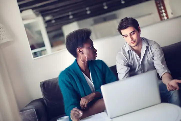 An advisor and client discuss ways to invest $10,000.
