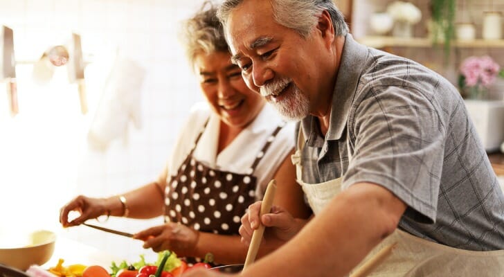 Asia couple cooks dinner