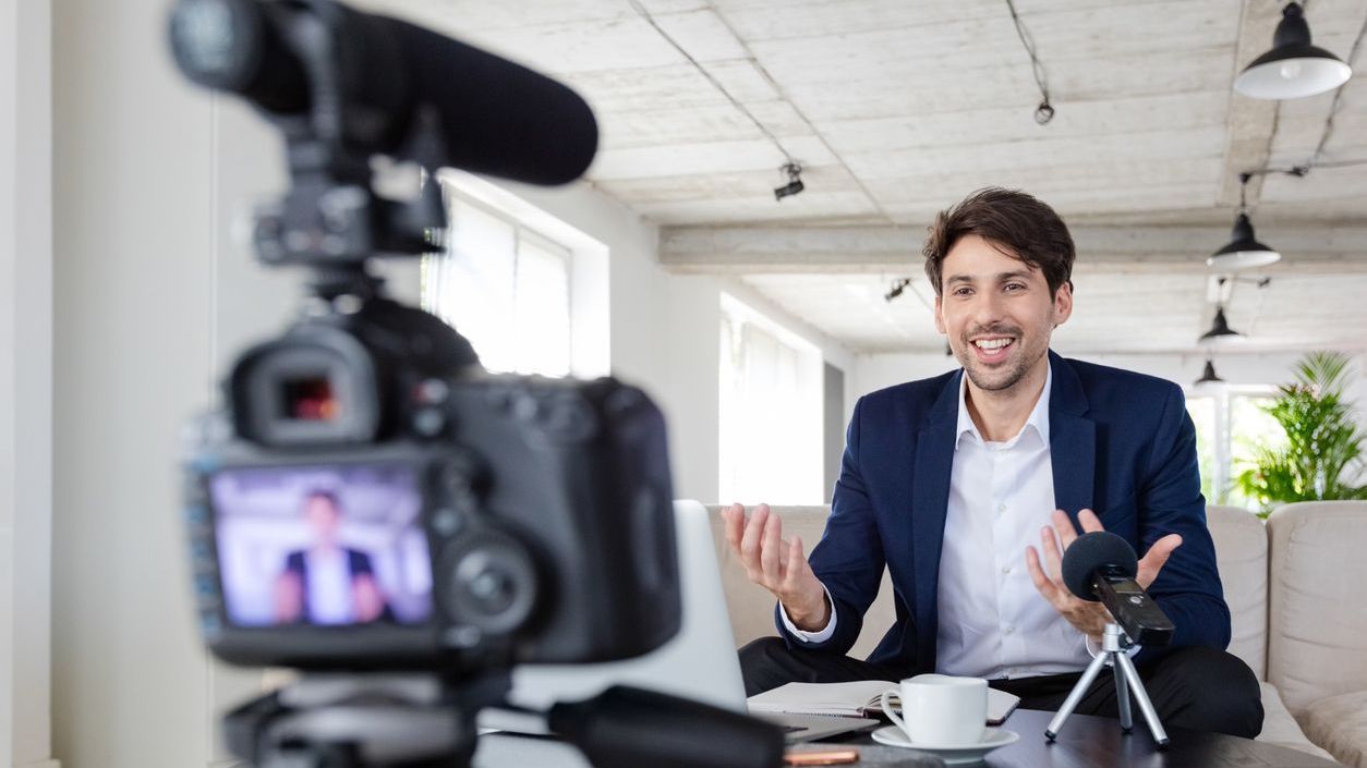 An advisor creates content for social media marketing.