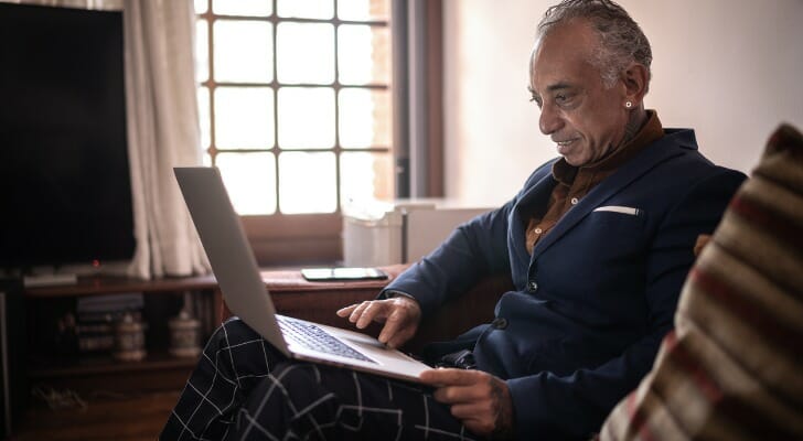 Man using an online trading platform.