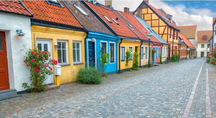 An image of a Swedish town, with all the buildings brightly painted.
