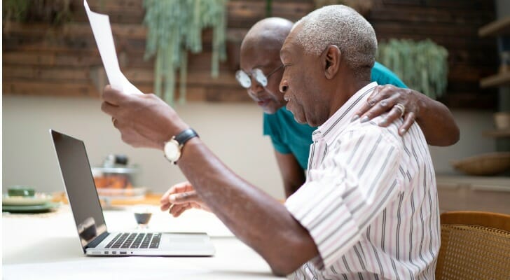 A couple estimating how much they could owe in taxes for their RMDs.