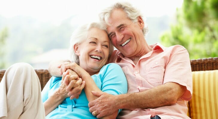 Senior couple sitting outside