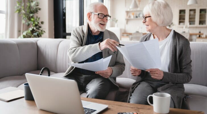 A senior couple discussing their definition of wealthy.