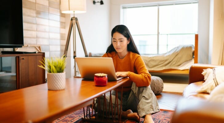 Woman uses an online investment platform