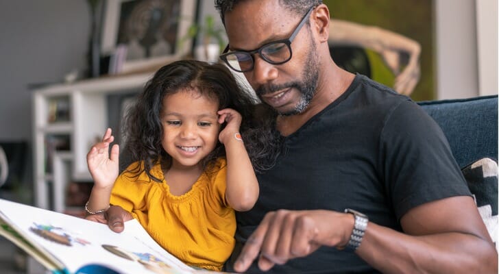 A man with his daughter, planning to retire at 45 with $3 million.