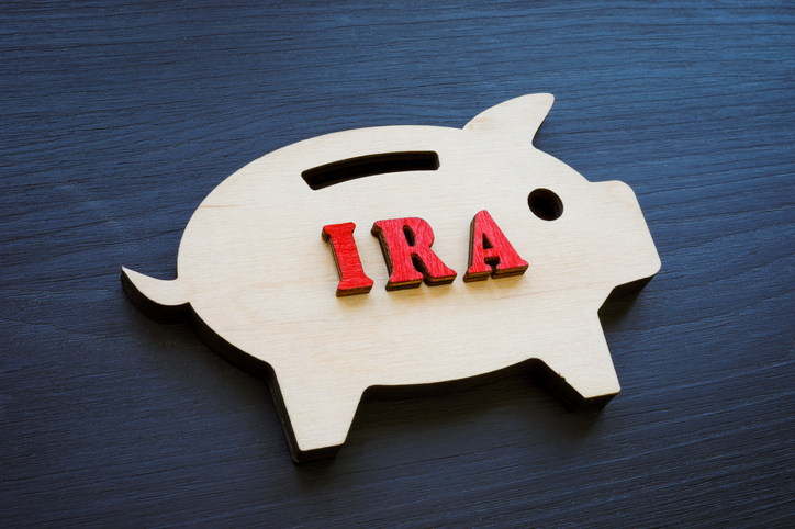 You can move money from an IRA to a savings account, but it counts as a withdrawal and may trigger taxes and penalties.