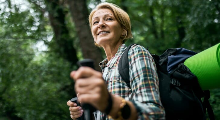 A woman enjoying her retirement, having retired at 50 with $2 million.