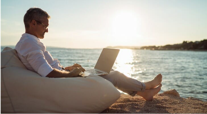 A man researching how he can retire at 50 with $2 million.