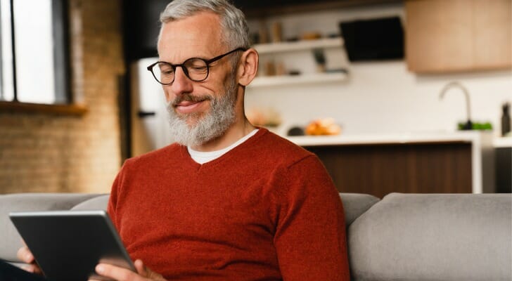 A man enjoying his retirement, having retired at 45 with $2 million.