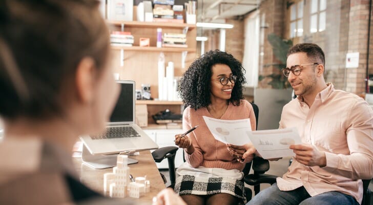 A couple sit down with their advisor to ask, "Is $10 million enough to retire at 30?"