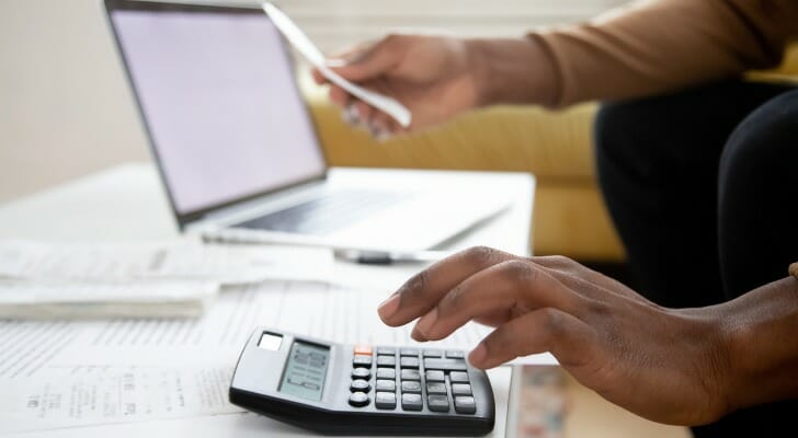 An investor researching, "How much should I invest per month?"