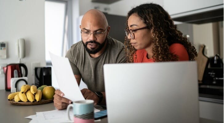 A couple reviewing their tax return.