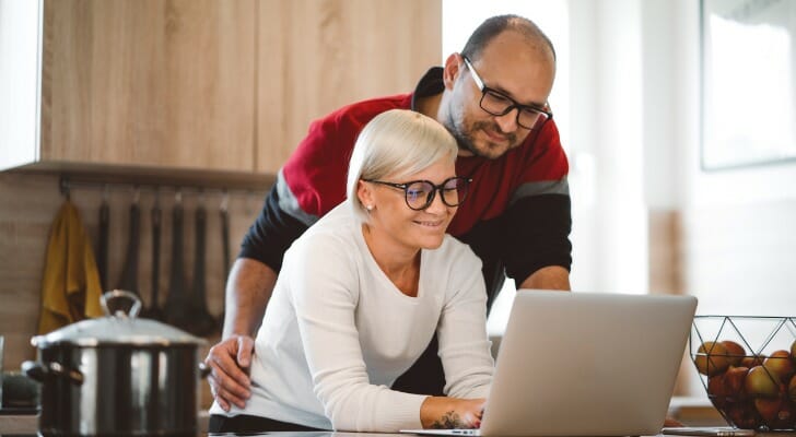 A couple reading a review of Gentreo before deciding to use the tool.