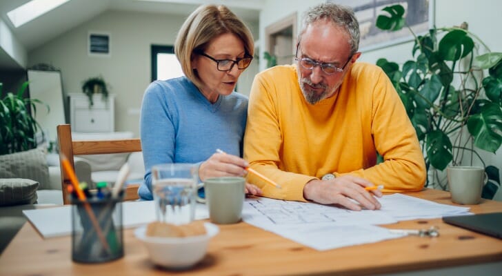 A couple reviewing their retirement account.