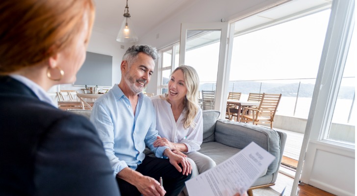 Clients meeting with a financial advisor to discuss estate taxes.