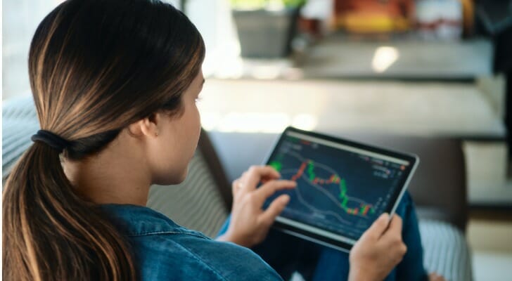 An investor looking at a stock chart.