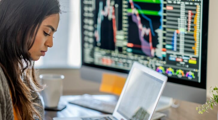 An investor reviewing Buy to Open vs. Buy to Close.