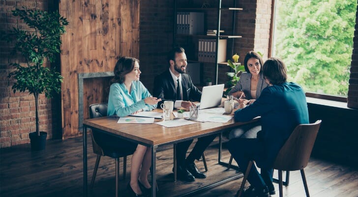 Advisors reviewing strategies to nurture leads and grow AUM.