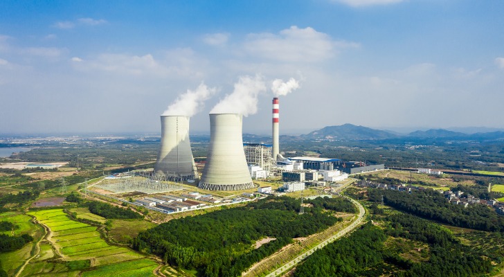 Image of two cooling towers in a nuclear power facility.