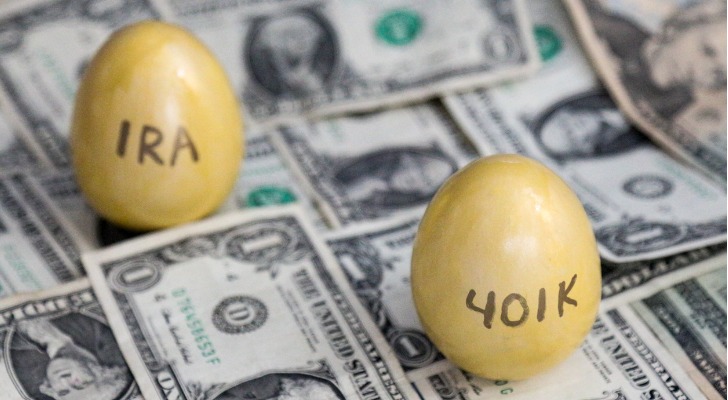 IRA and 401(k) eggs on dollar bills