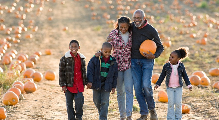 A couple with their grandchildren in retirement.