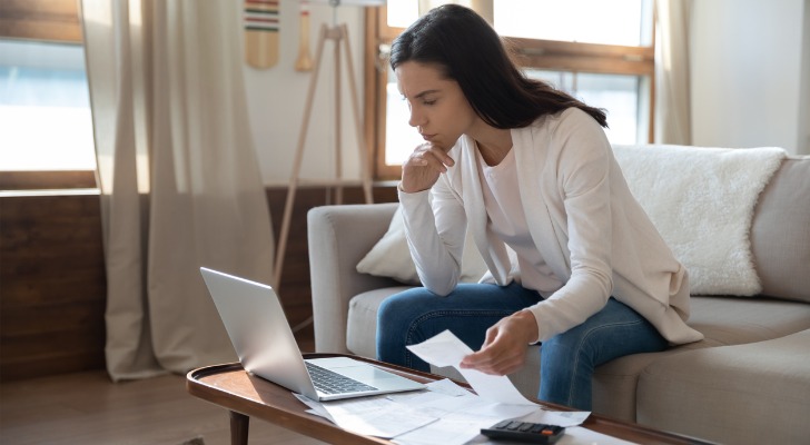 Girl calculating the potential return of index funds