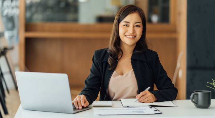 A young woman in her office.