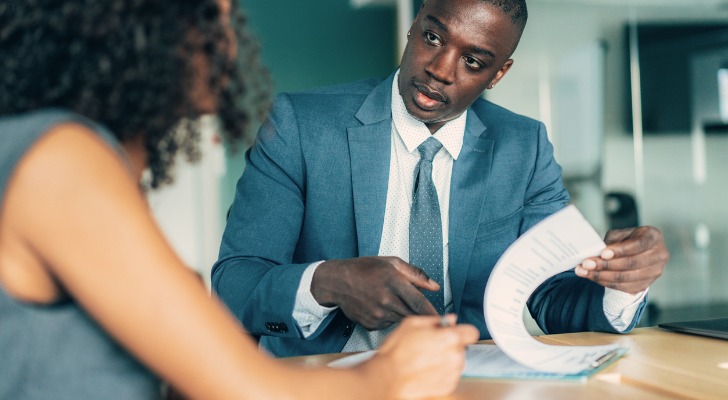 Financial advisor working with a wealthy person