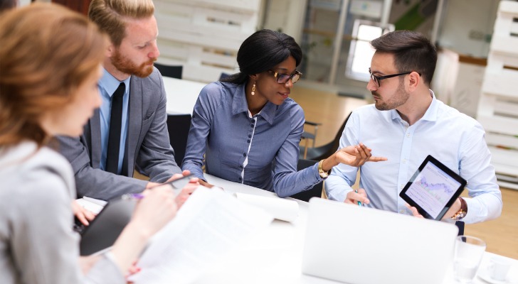 Financial advisors discussing the future of the business
