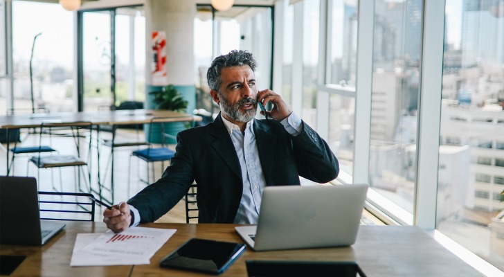 Man discussing passive income ideas for retirement with his financial advisor