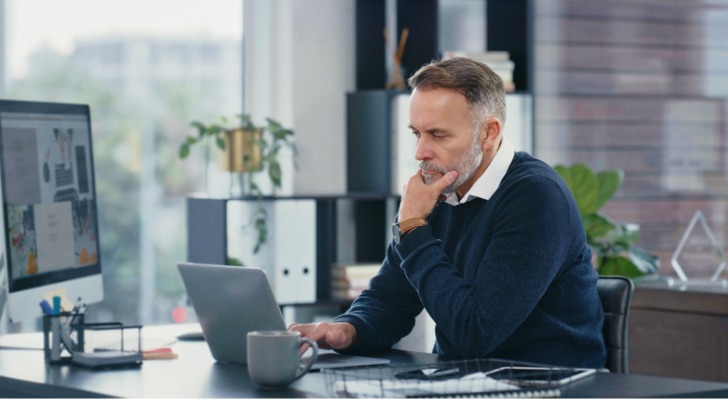 High earning man studies his finances
