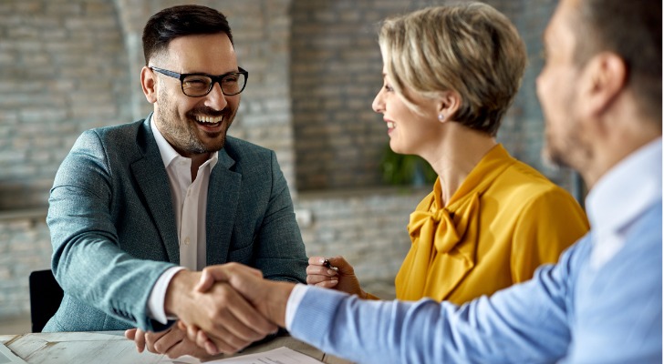 Financial advisor meeting with clients