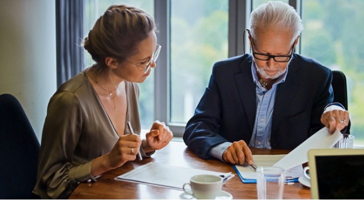 A woman and her financial advisor estimate how long $750,000 will last in retirement.
