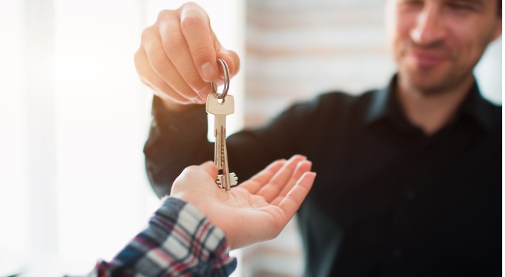 A person buying their first investment property.